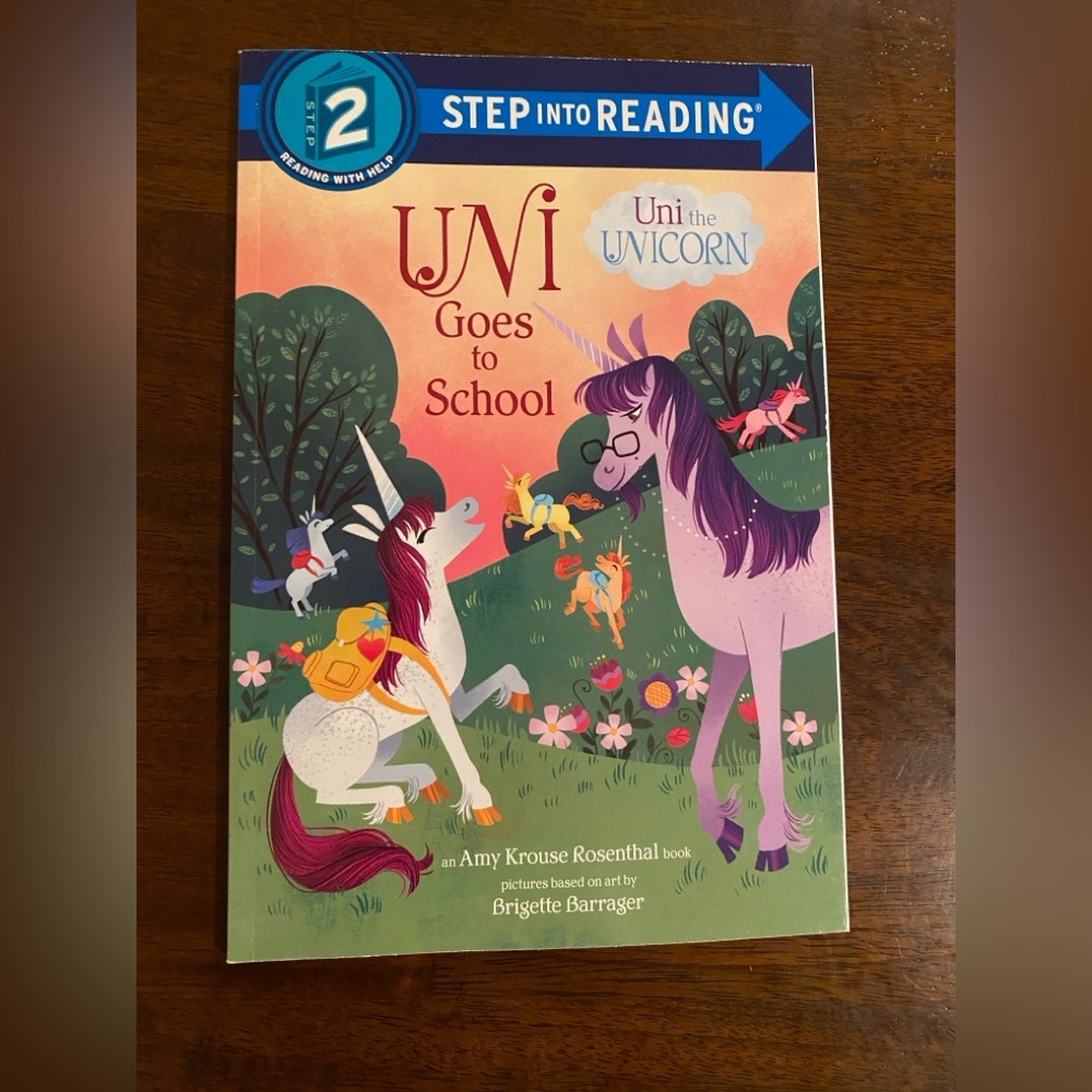 uni goes to school step 2 reading book.